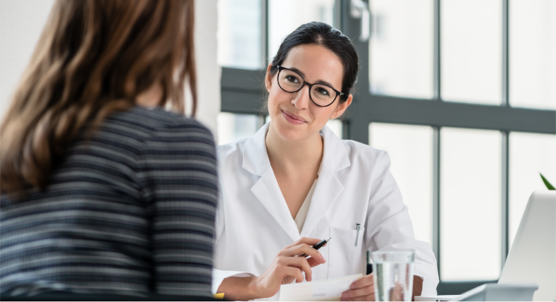 woman talking with doctor